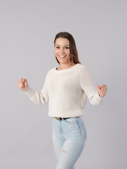 young pretty woman spreading arms with euphoric and winning fitness