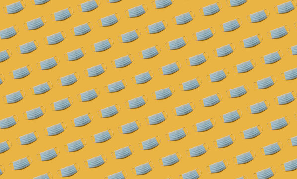Flu masks on orange background