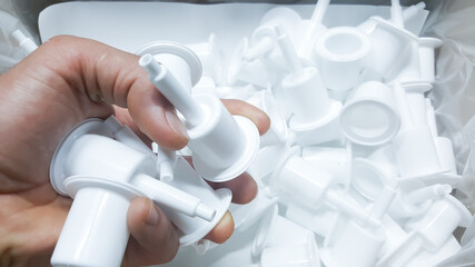 Fototapeta premium Plastic product parts. made from plastic injection molding machine, in plastic factory industry.