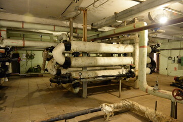 Heating pipes in the basement of the building