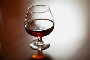 Glass with cognac close up
