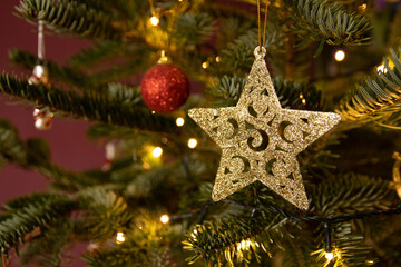 Festive decorations on the Christmas tree © FotoWave Dawid Nowak
