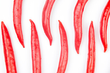 Red hot chili peppers on a white background. Vitamin vegetable food