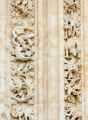 Modern astronaut carved on the facade of the old and historical Salmanca Cathedral