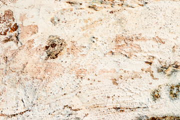 Texture of a concrete wall with cracks and scratches which can be used as a background