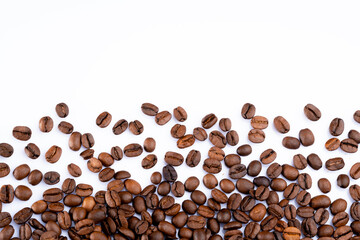 Roasted coffee beans on white background	