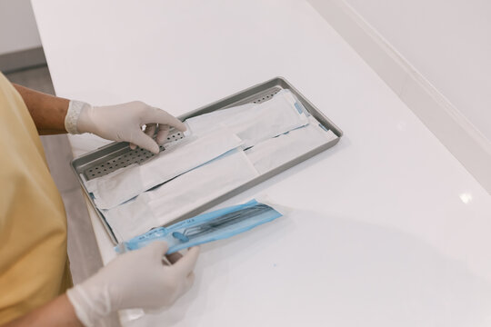 Young Female patient with open mouth examining dental inspection