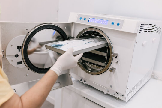Young Female patient with open mouth examining dental inspection