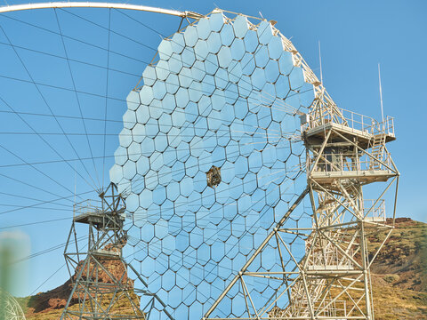 MAGIC telescope with mirror segments against cloudless blue sky in daylight at astronomical observatory site on island of La Palma in Spain