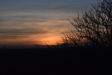 Obraz premium sunset over the river