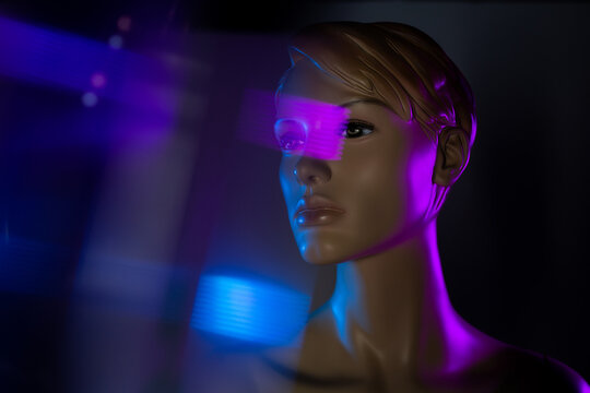 Creative image of mannequin woman in dark room with light effects