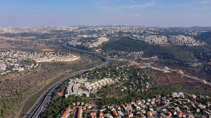 Jerusalem city with tel aviv highway (road one) traffic, Aerial view
Panorama shot with jerusal main entrance, Israel,drone view
 - obrazy, fototapety, plakaty