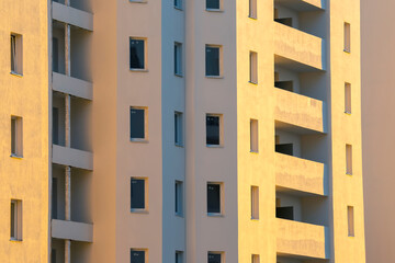 Facade of a new multi-story residential building. architecture and modern construction