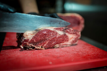 cutting piece of meat