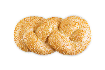 Wheat white braided bread with sesame seeds on a white isolated background