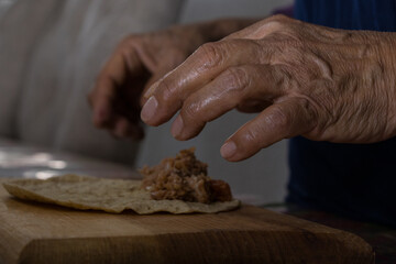 A chef preparing Mexican tacos