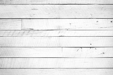Obraz na płótnie Canvas Rustic painted wood wall or floor. Rough wooden planks. White light neutral flat faded tones.