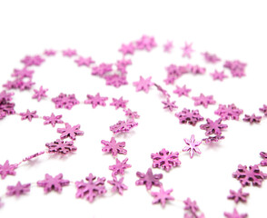 Necklace for festive decoration in the form of snowflakes isolated on white background.