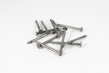 Some nails on a white background