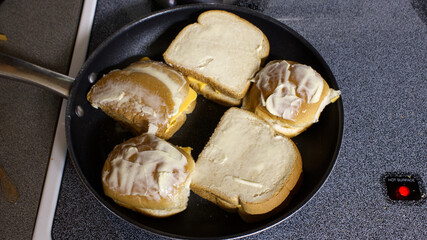 Grilled Cheese Cooking on a Stove