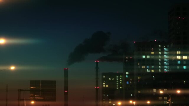 Night urban landscape. High rise buildings along highway. Large pipes releasing black smoke. Concept of ecology in cities. Lanterns anamorphic effect