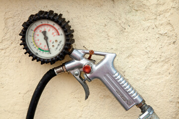 Tire air pressure gauge and delivery handle. Rzeczyca Central Poland