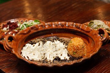 Mexican food enchiladas with mole dish