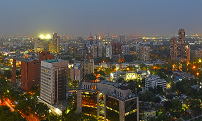  Aerial View of the city skyline at night central New Delhi India.