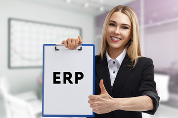 Business, technology, internet and network concept. Young businessman thinks over the steps for successful growth: ERP