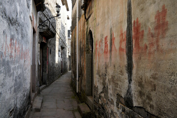 A narrow alley snakes between Ming and Qing Dynasty houses in the village of Tangyue, Anhui Province, China.