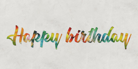 message HAPPY BIRTHDAY writte in water colors on paper background