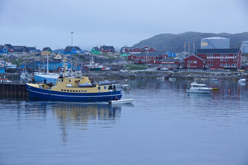Fototapeta premium Founded in the mid-1700s, the little fishing town of Aasiaat, Greenland, is situated on an island in the outermost southern part of Disko Bay.