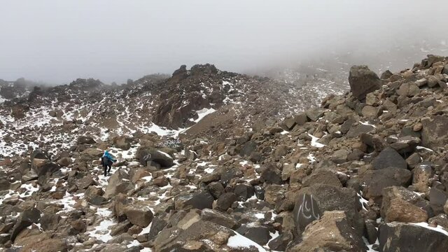Mountaineers climbing at Mount Savalan (Sabalan) summit in Savalan, Iran. Savalan is the third highest mountain in Iran. It&rsquo;s 4811 meters altitude.