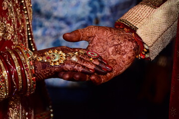 Portrait of bride and groom in Indian wedding