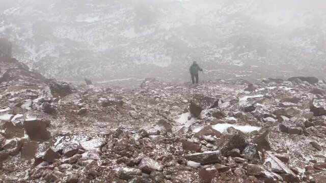 Mountaineer climbing at Mount Savalan (Sabalan) summit in Savalan, Iran. Savalan is the third highest mountain in Iran. It&rsquo;s 4811 meters altitude.