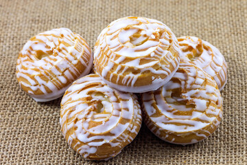 Delicious sweet biscuits with custard and fondant for tea and coffee.