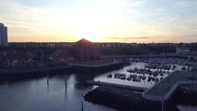 Boats in Sunderland Marina during sunset.