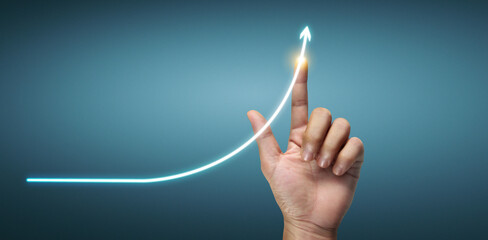 Hand touching  graphs of financial indicator and market analysis chart