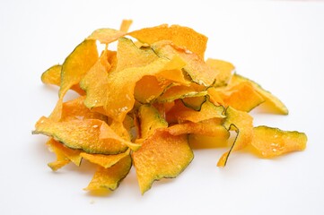 Naklejka premium sweet pumpkin slice fried on white background