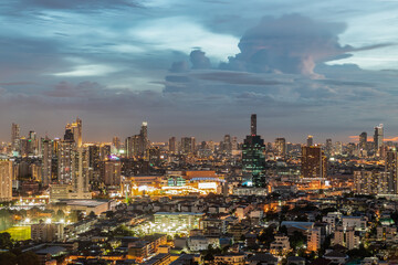 Fototapeta na wymiar Bangkok, thailand - Oct 01, 2020 : Bangkok downtown cityscape in Business district with bright glowing lights at night give the city a modern style. No focus, specifically.