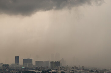 Fototapeta na wymiar Bangkok, thailand - Oct 03, 2020 : PM 2.5 or Heavy smog was covered the Bangkok building the morning.There are air pollution under heavy cloud. Focus and blur.