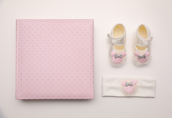 Baby accessories on white background, flat lay