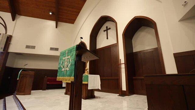 Empty Church Pulpit Tracking Cross In Background