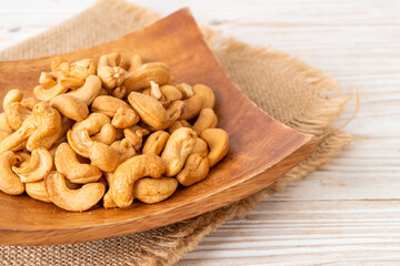 Cashew nuts in wooden bowl