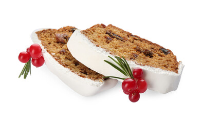 Slices of traditional Christmas cake with cranberries and icing isolated on white. Classic recipe