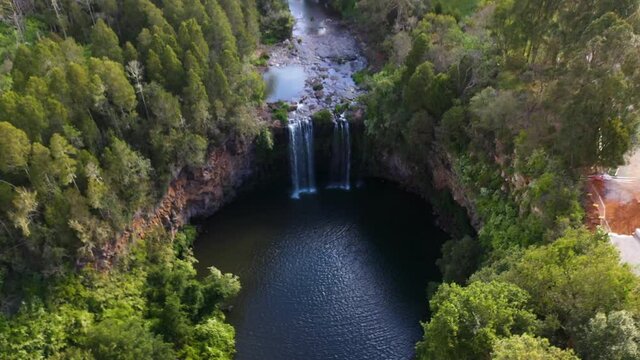 Lowering drone shot of Dangar Falls Australia