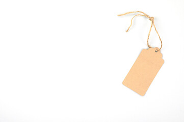 Carton tag for gift box with space for text on white background. Top view.