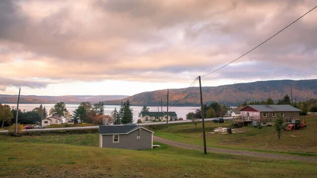 Cape Breton rural village scenery and houses with the background of fall colors, Cabot Trail, Cape Breton, Nova Scotia