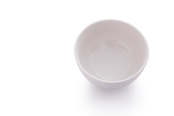 White ceramic bowl on white background.