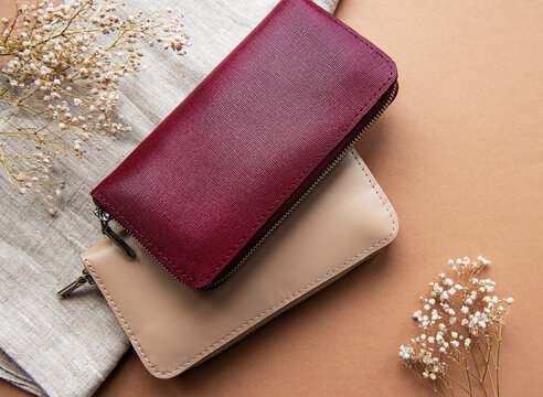 Red and beige leather wallets